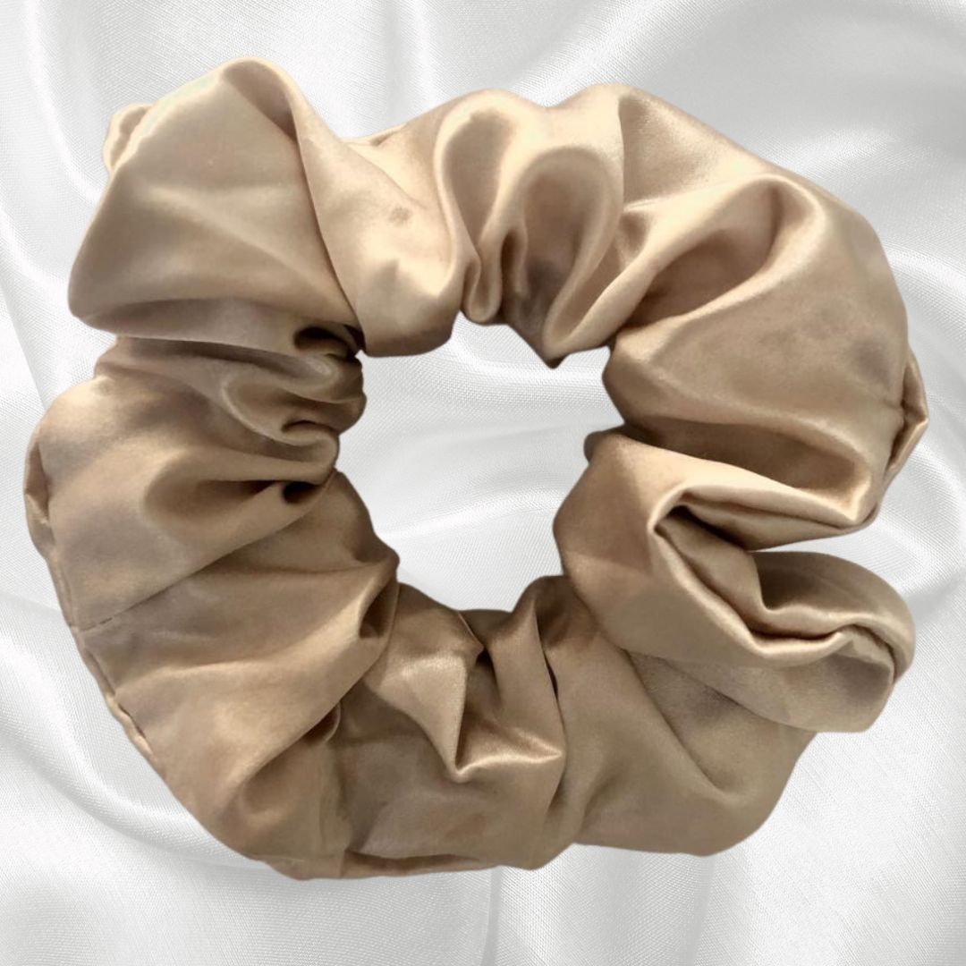 Anti-breakage mulberry silk Queen scrunchie in ticked pink. contain natural proteins (amino acids) to help condition and protect your hair prevent breakage won't snag or leave hair creases reduce frizz are hypoallergenic; and independently certified to Oeko-Tex Standard 100 (which means they contain no harmful substances). Champagne Supernova
